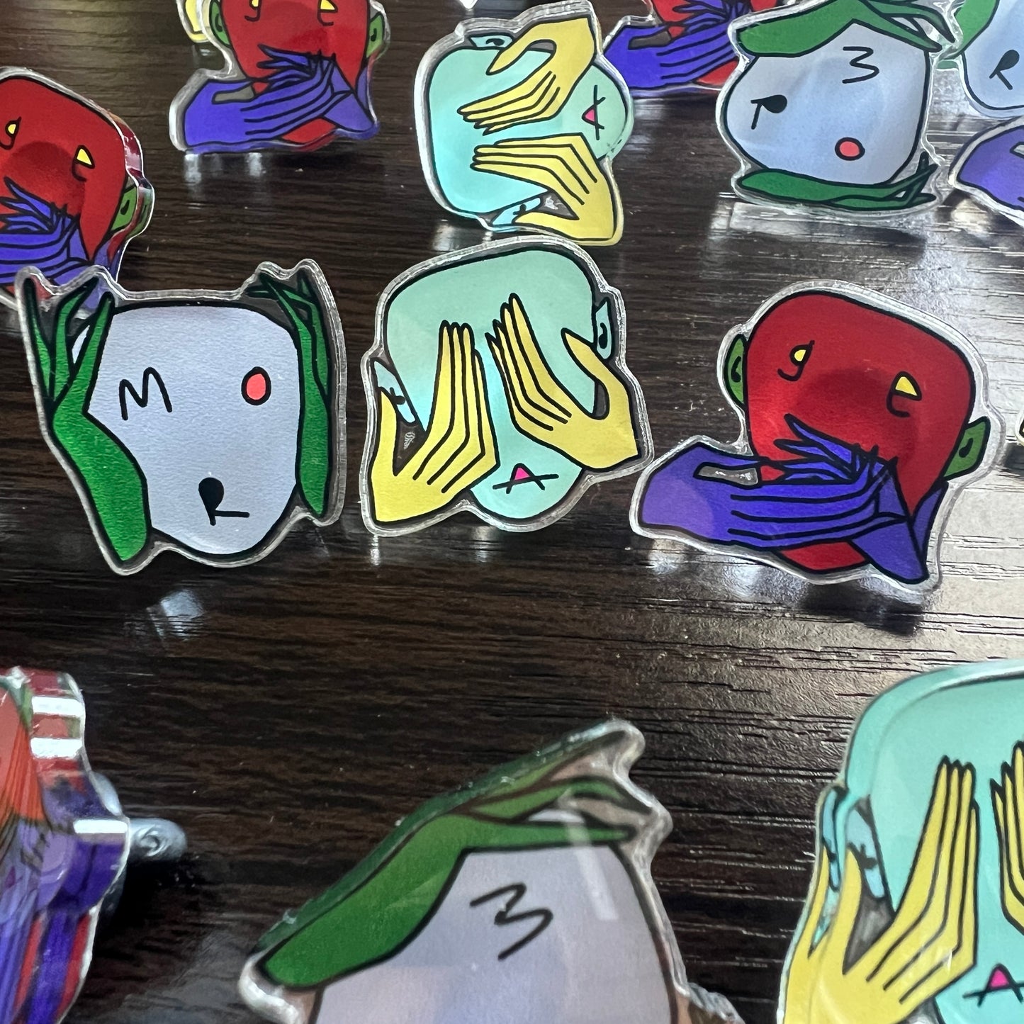 Morage faces pins